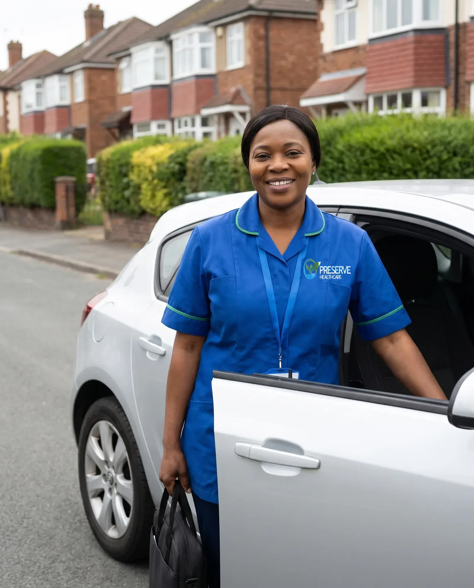 Preserve Healthcare carer arriving by car for a home care visit on a Coventry street